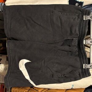 Nike Black Shorts with Bold White Swoosh